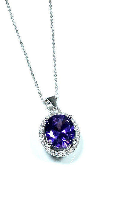 Sterling Silver Classic Oval Design CZ Pendant with CZ Stone Accent and Elegant Bail