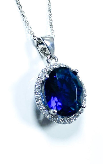 Sterling Silver Classic Oval Design CZ Pendant with CZ Stone Accent and Elegant Bail