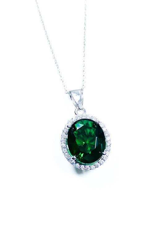 Sterling Silver Classic Oval Design CZ Pendant with CZ Stone Accent and Elegant Bail